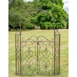 ARCHITECTURAL GARDEN GATE, Regency style wrought metal, 245cm H x 152cm W x 23cm D.