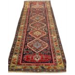 ANTIQUE CAUCASIAN CORRIDOR CARPET, 332cm x 138cm.