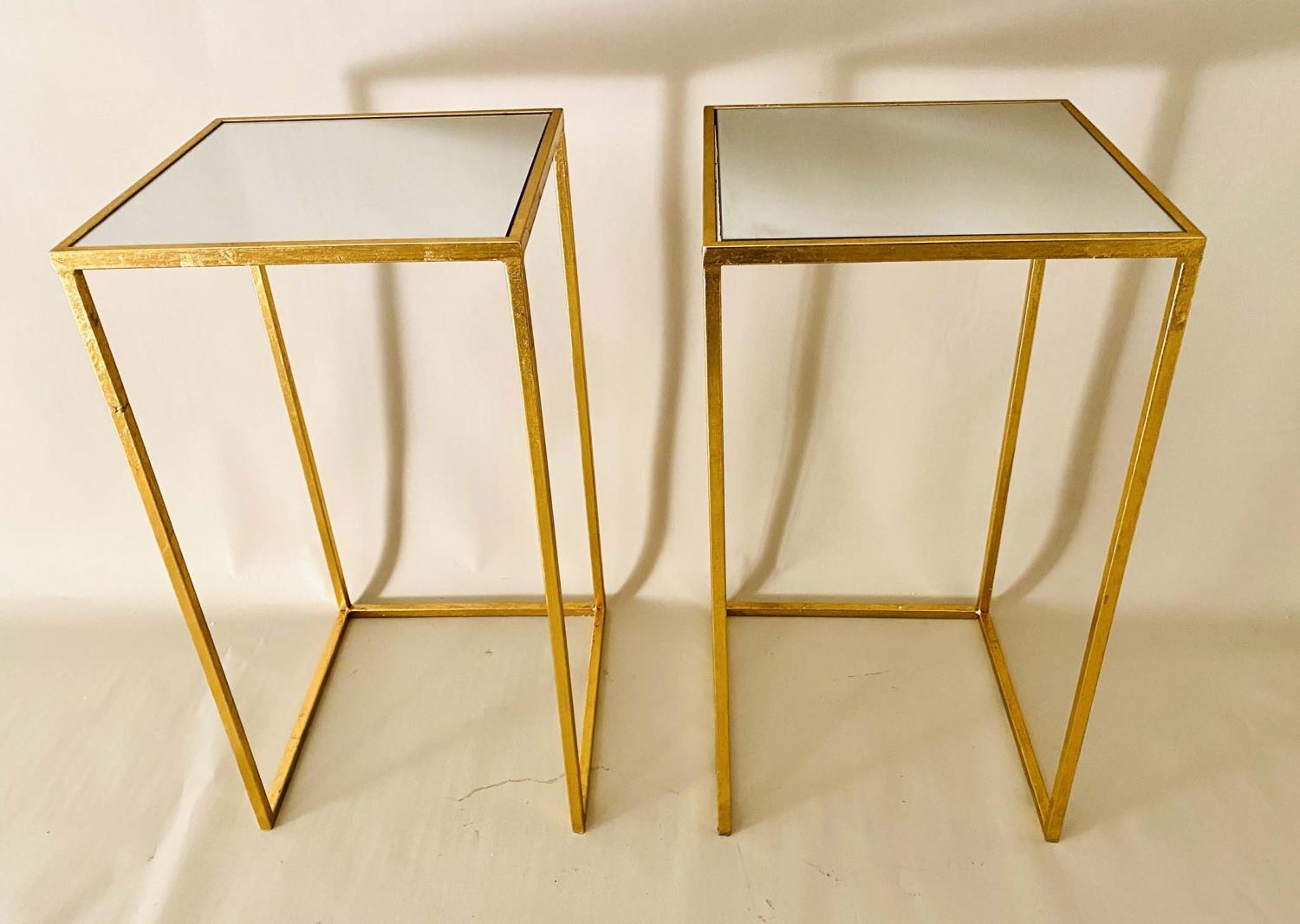 SIDE TABLES, a pair, 66cm H x 36cm W, 1960's French style, mirrored glass tops, gilt metal