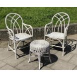 CONSERVATORY ARMCHAIRS, a pair, painted rattan, wicker and cane bound with rounded trellis backs