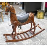 ROCKING HORSE, 92cm H x 108cm W x 33cm D, hardwood, leather and brass.