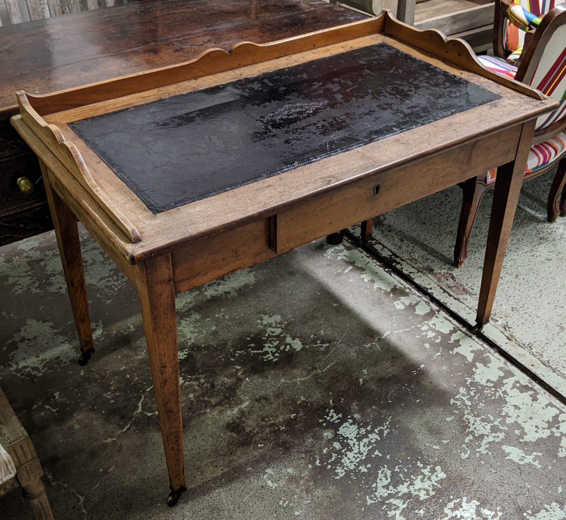 WRITING TABLE, 111cm W x 64cm D x 85cm H, 19th century French walnut with a shaped gallery and black - Image 2 of 6