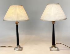 TABLE LAMPS, a pair, Corinthian capped silvered metal each with tampering fluted column and