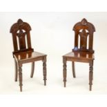 HALL CHAIRS, 88cm H x 42cm W, a pair, Victorian mahogany with incised arched backs. (2)