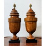 URN TABLE LAMPS, a pair, turned wood and string inlaid on square black bases, 53cm H x 19cm. (2)