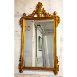 WALL MIRROR, 128cm H x 75cm W, Louis XVI style, gilt framed with urn crest.