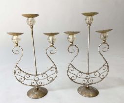 CANDELABRA, a pair, distressed metal each with three branches, 55cm H. (2)