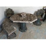 CHINESE GARDEN SUITE, in Summer Palace manner, carved stone comprising a table 107cm L x 73cm, two
