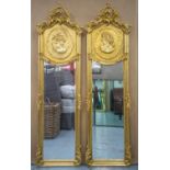 PIER MIRRORS, 178cm H x 53cm W, a pair, Belle Epoque style, gilt framed with narrow plates. (2)