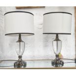 TABLE LAMPS, a pair, glass and polished metal urn design, with shades, 63cm H. (2)