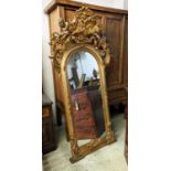 WALL MIRROR, 95cm W x 194cm H mid 19th century Continental giltwood with torch and quiver, bird