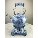 DUTCH DELFT BLUE AND WHITE TEAPOT, on stand, 18th century with naturalistic silver mounted swing