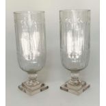 HURRICAIN LANTERNS, a pair, cut glass cylindrical with engraved detail and stepped base, 40cm H. (2)