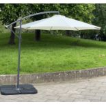 SUN UMBRELLA, circular cream canvas retractable wind up with frame and weights, 300cm W. (6)