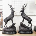 AFTER J MOIGNIES, a pair of stags, bronze, 73cm H on marble bases. (2)
