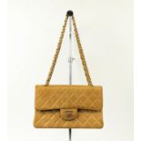 VINTAGE CHANEL FLAP BAG, with front flap closure and iconic interlocking CC lock, leather and