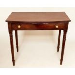 WRITING TABLE, George III period mahogany and ebony lined with a full width frieze drawer and ring