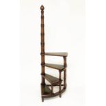 LIBRARY STEPS, a set Georgian style walnut with four tooled leather trimmed spiral treads with pole,