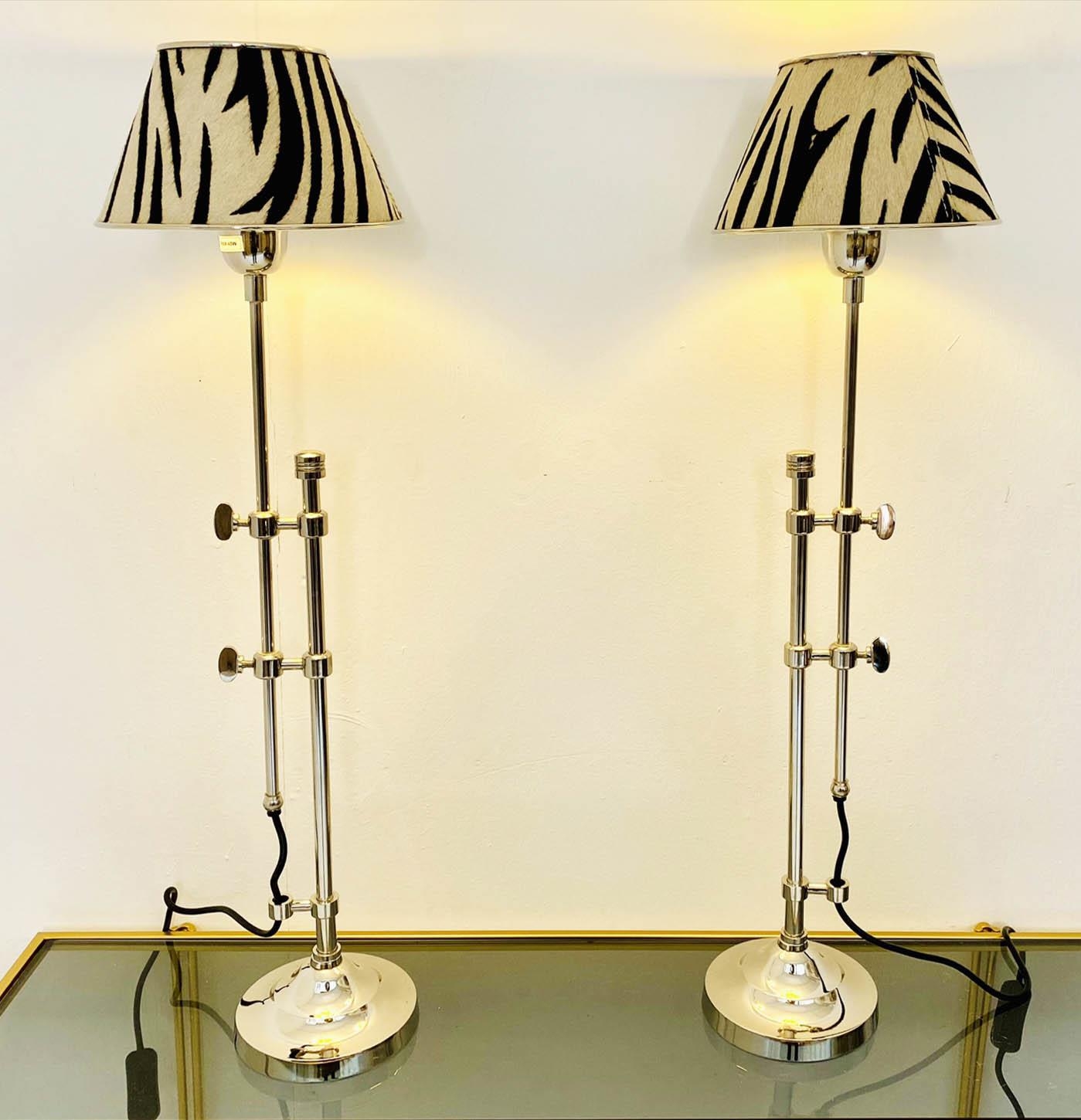 LIBRARY TABLE LAMPS, a pair, height adjustable, faux zebra hide shades, 68cm x 20cm x 20cm.