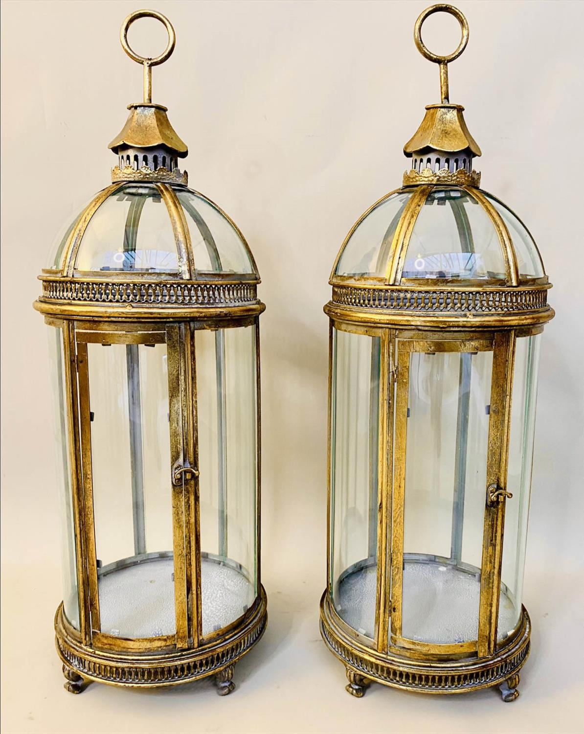 STORM LANTERNS, pair, 80cm H x 28cm diam. in the Regency style, gilt metal frames, glazed sides