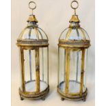 STORM LANTERNS, pair, 80cm H x 28cm diam. in the Regency style, gilt metal frames, glazed sides