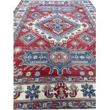 FINE EAGLE KAZAK CARPET, 355cm x 265cm.