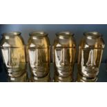 RAPA NUI STYLE VASES, a set of four, gold tinted glass, 35cm H. (4)