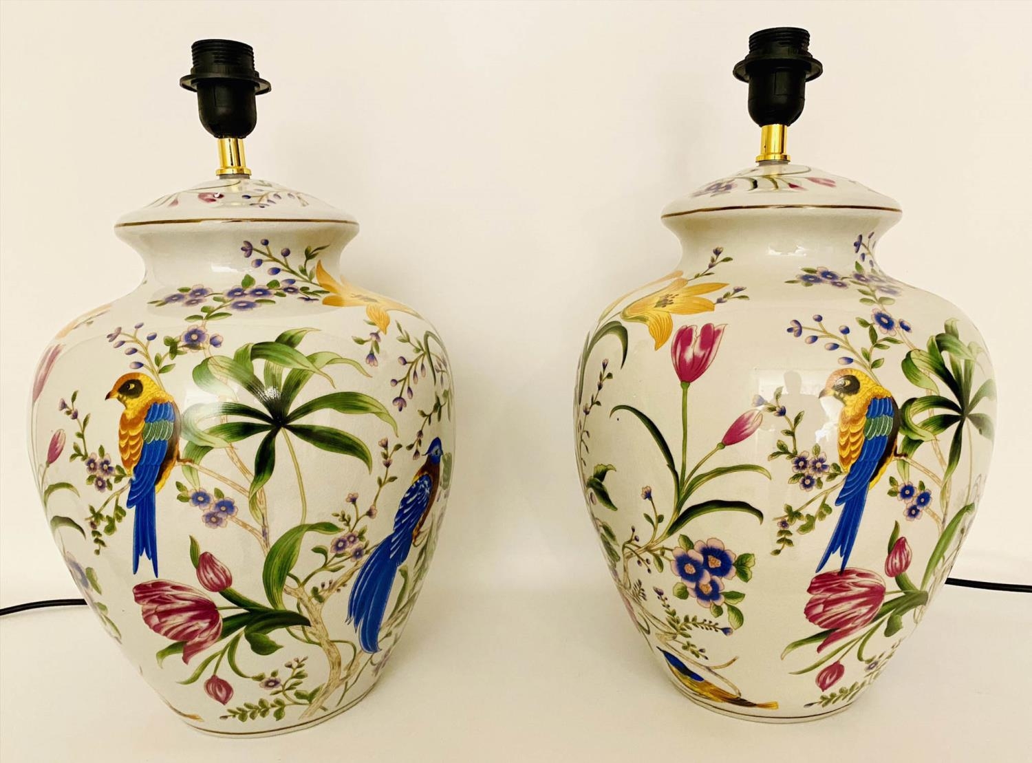 TABLE LAMPS, a pair, 46cm high, 27cm diameter, glazed ceramic with floral design with birds. (2)