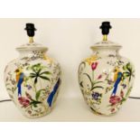 TABLE LAMPS, a pair, 46cm high, 27cm diameter, glazed ceramic with floral design with birds. (2)