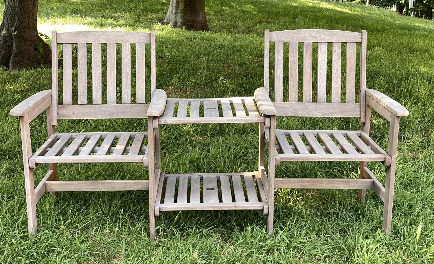CONVERSATION GARDEN SEAT, weathered slatted teak with two armchairs and conjoining two tier table,