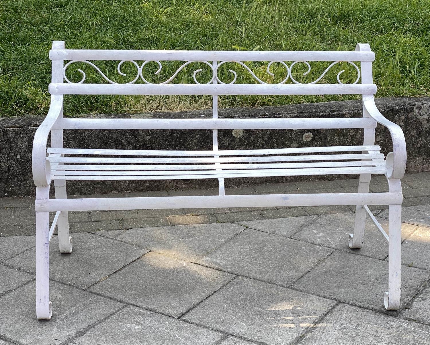 GARDEN BENCH, antique wrought iron and white painted with slatted back and seat and scroll arms, - Image 2 of 6