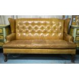 WING SOFA, 104cm H x 180cm W, tan leather.