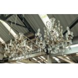 CHANDELIERS, a pair, approx 70cm H x 55cm W, with glass droplets.