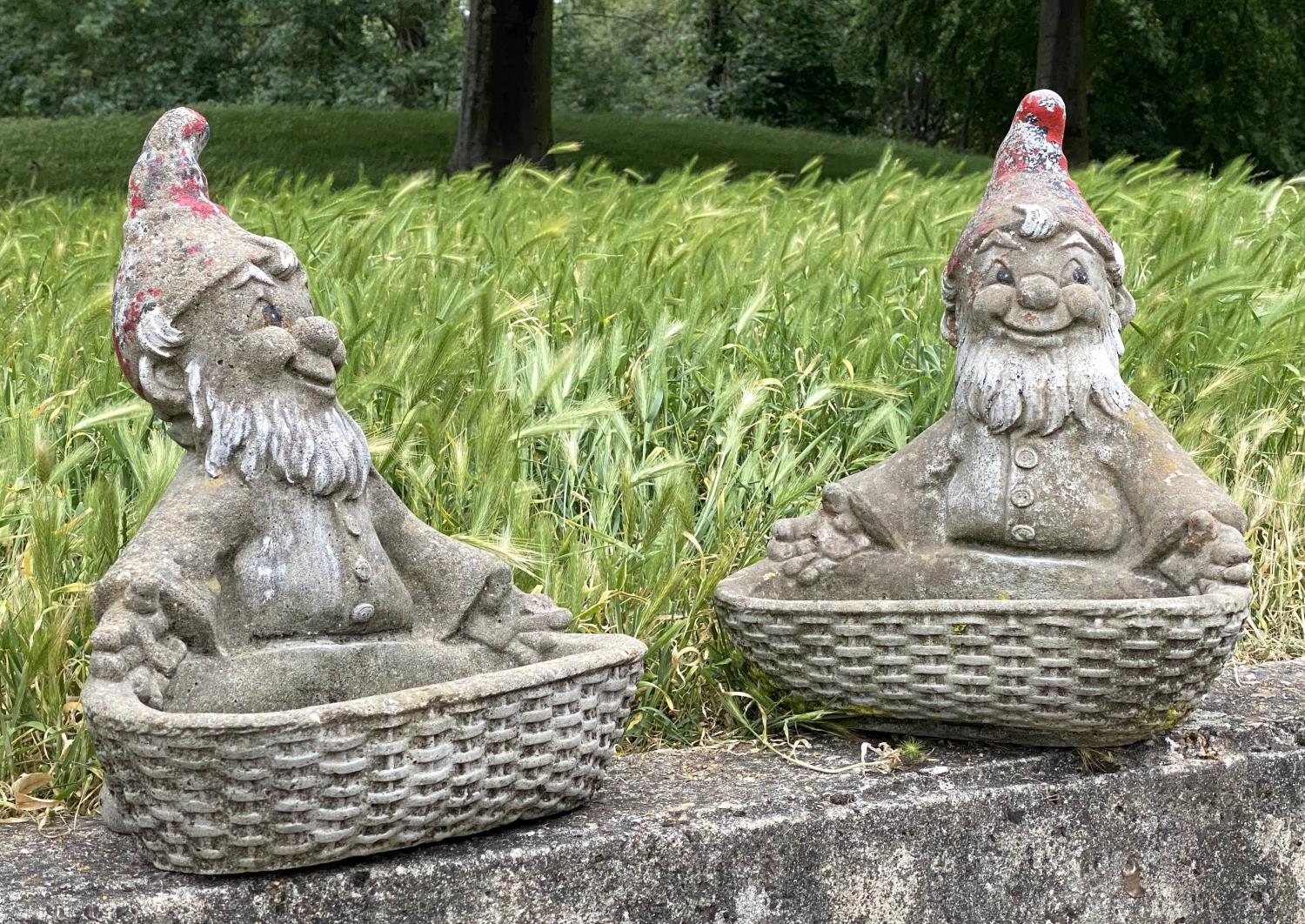 GARDEN GNOMES/PLANTERS, a pair, weathered reconstituted stone with traces of colour, 35cm W x 41cm