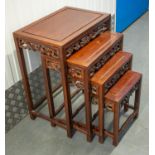 QUARTETTO TABLES, a nest of four, Chinese rosewood, largest 51cm W x 36cm D x 67cm H. (4)