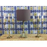 ECCLESIASTICAL CANDLESTICK LAMPS, and a pair of three scrolling branch candlestick lamps, 60cm H. (