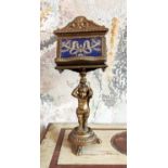 READING STAND, 19th century Italian gilt wood rotating with a cherub base and modern fabric