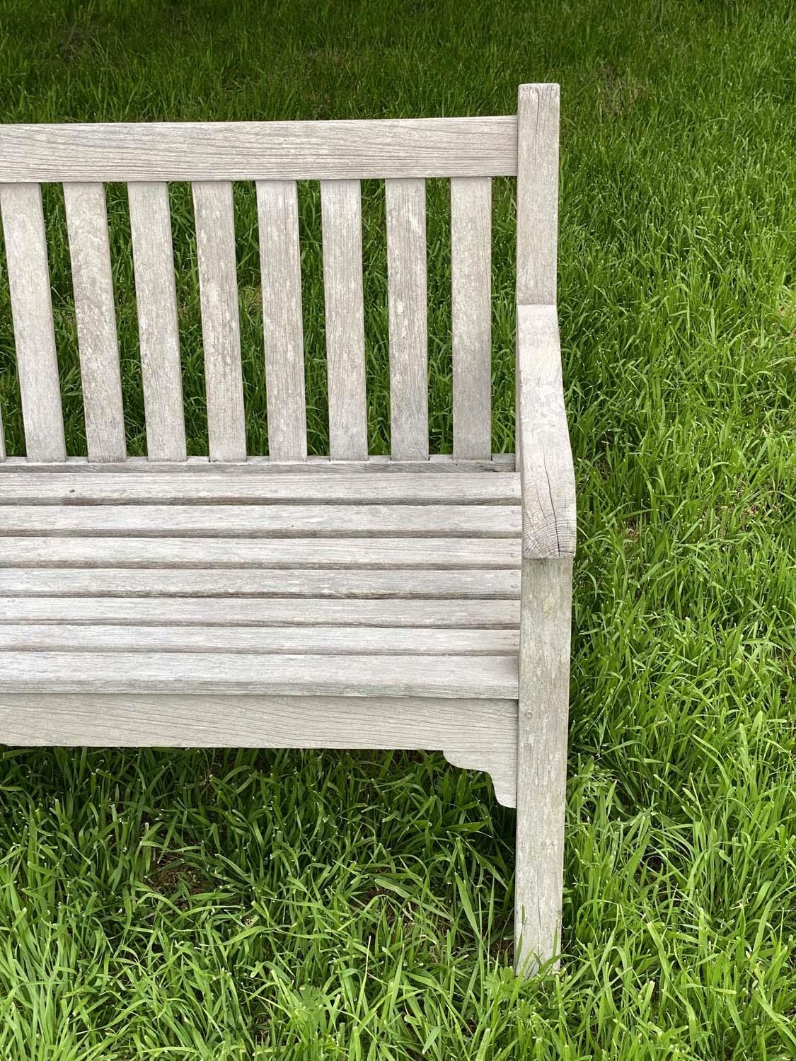 GARDEN BENCH, silvery weathered teak of slatted and pegged construction, 180cm W. - Image 2 of 4