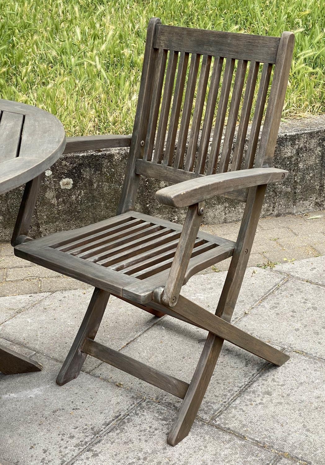 GARDEN TABLE AND CHAIRS, weathered teak circular folding with two arm chairs, table 100cm W x 73cm - Image 4 of 5