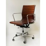 REVOLVING DESK CHAIR, Charles and Ray Eames inspired, with ribbed tan leather seat revolving and
