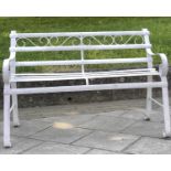 GARDEN BENCH, antique wrought iron and white painted with slatted back and seat and scroll arms,