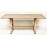 REFECTORY TABLE, rectangular solid oak, with carved edge and raised upon twin two pillar trestles,