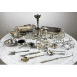A QUANTITY OF SILVER AND PLATE, including five napkin rings, two toast racks, a cream jug and