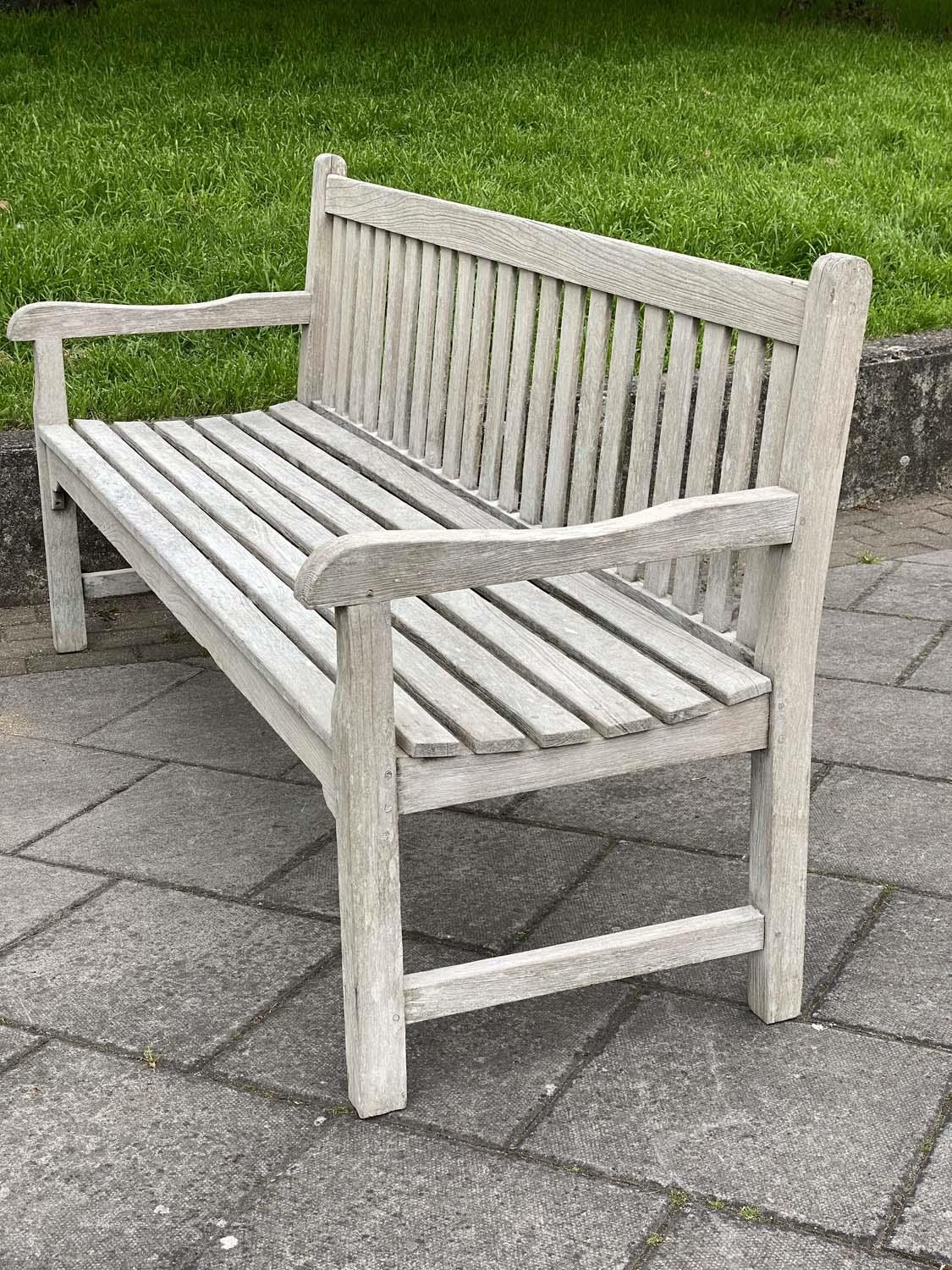 GARDEN BENCH, silvery weathered teak of slatted and pegged construction, 180cm W. - Image 3 of 4