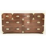 LOW CAMPAIGN STYLE CHEST, mahogany and brass bound with seven drawers, 153cm x 48cm D x 76cm H.