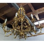CHANDELIER, approx 96cm H x 90cm H, gilt metal with foliate detail.