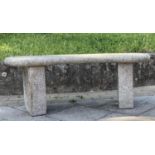 GARDEN SEAT, weathered reconstituted stone of arched form with block supports, 120cm x 45cm H.
