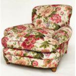 ARMCHAIR, early 20th century English country house rose printed cotton upholstered with rounded back
