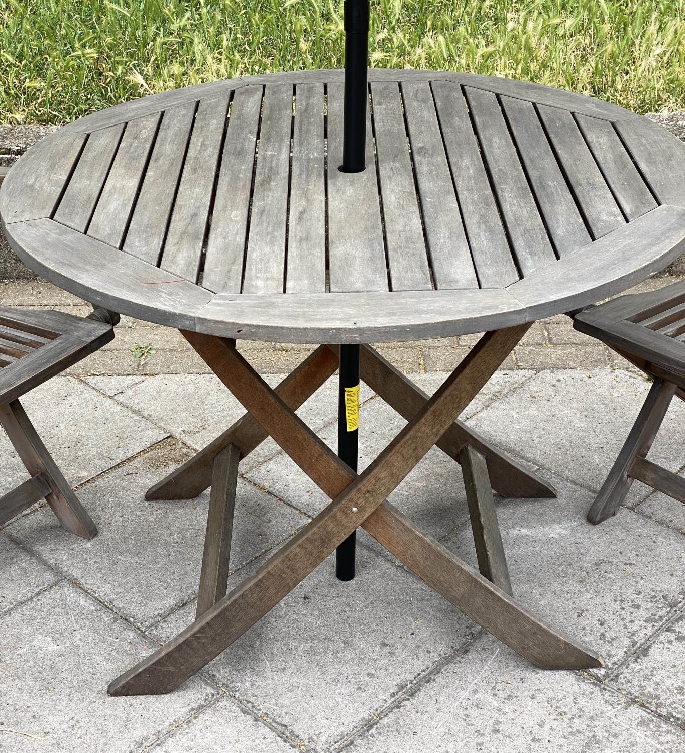 GARDEN TABLE AND CHAIRS, weathered teak circular folding with two arm chairs, table 100cm W x 73cm - Image 3 of 5