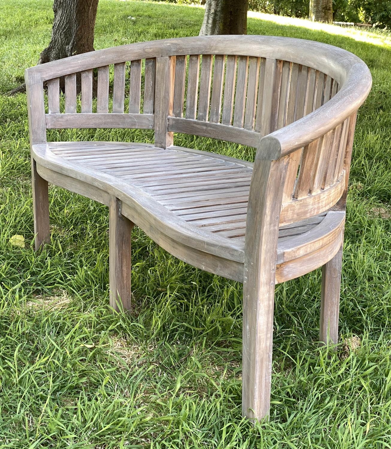 BANANA GARDEN BENCH, weathered teak with curved back and slatted construction, 150cm W. - Image 2 of 5